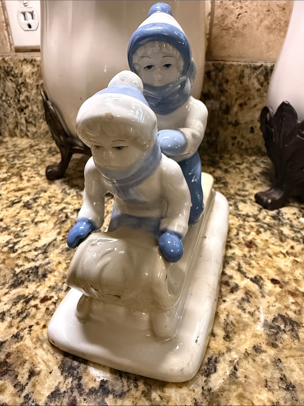 Porcelain Sledding Children Figurine in White and Light Blue